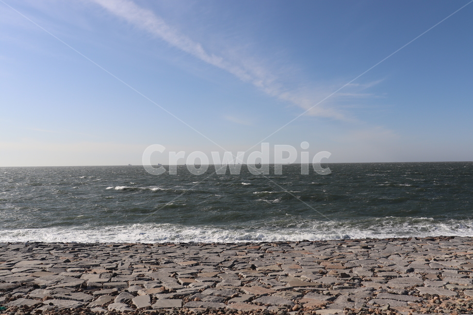 sky,cloud,rock,ocean,sea sky