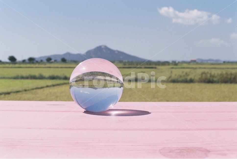 sky,rice paddy,contain,reflection,countryside,marble,mountain,reflect,mirage,field,refraction,light,sight,Emotion