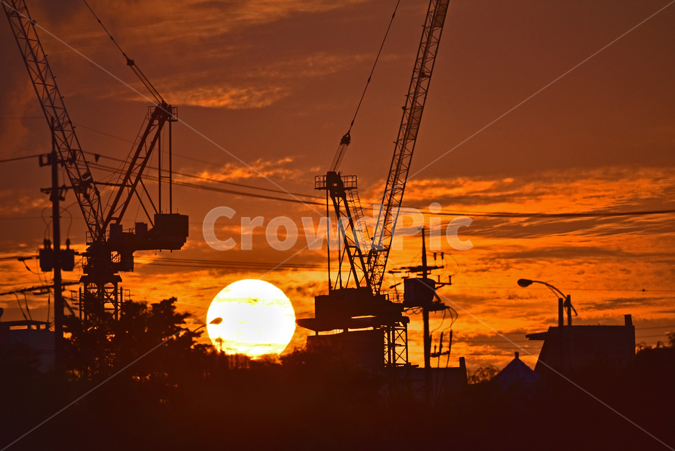 iron frame,industry,sun,construction crane,At sunset,constructioncrane,sight,construction,tower crane,crane,construction site,brown,structure,site,sunlight,Construction site,background,sunset,silhouette,orange color,nightfall