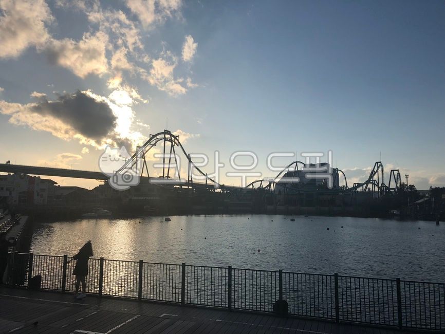 sky,cloud,Amusement Park,Roller Coaster,railing,sunset,clear,lake
