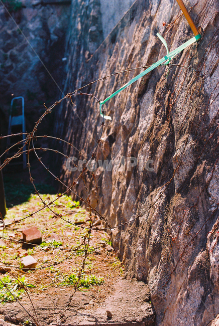 rock,road,wire netting,wall,dead end