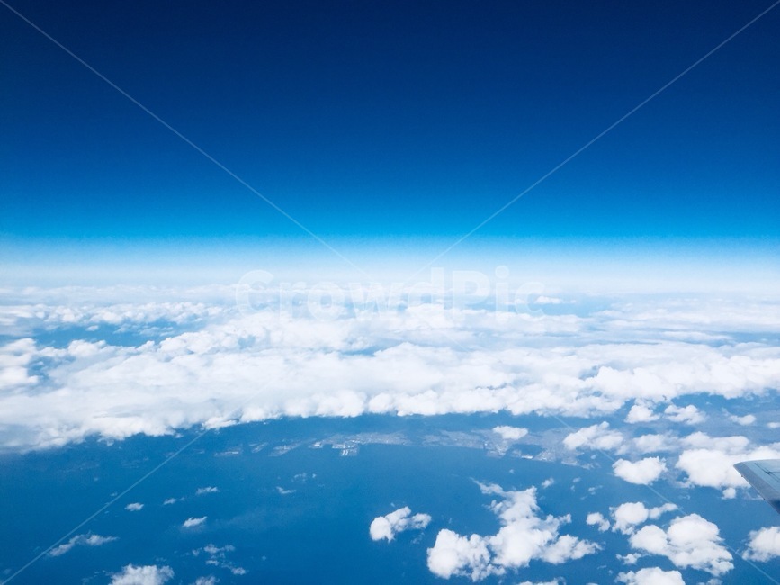 sky,cloud,blue,airplane,earth
