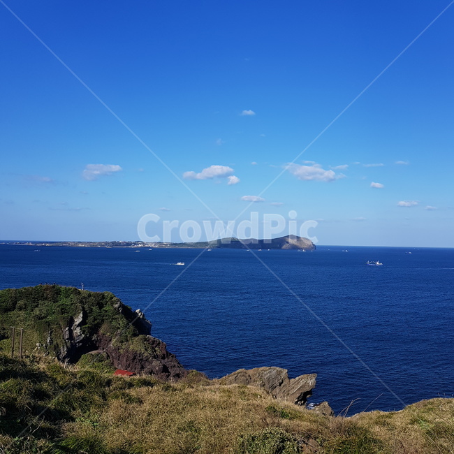 바다,섬,하늘,sea,sky,자연,풍경,nature,landscape,land,땅,outdoors,옥외,water,물,ocean,대양,shoreline,해안선,promontory,곶,coast,연안