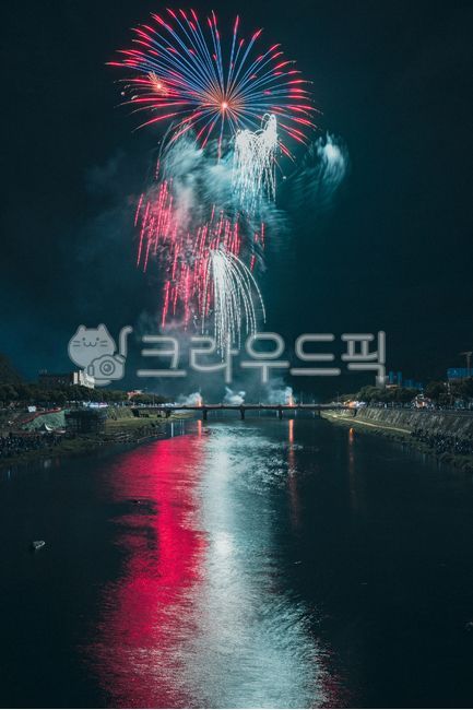 fireworks,water,building,urban,waterfront,cityscape,flame,architecture