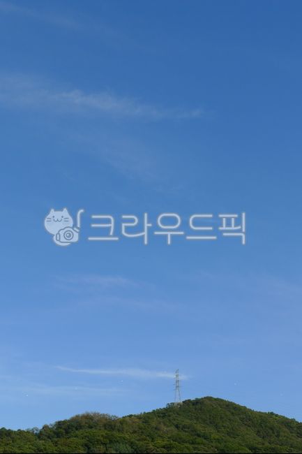 pylon,blue sky,suburbs,mountain,nature,transmission tower,building