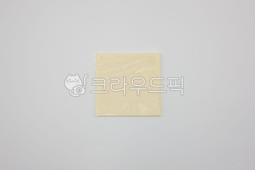 close up,Dairy products,ingredient,savory,health,Dairy processing,delicious,food,cheese,thin,sliced,oily,zest,wellbeing,ingredients,Cheddar Cheese,Sliced Cheese,object