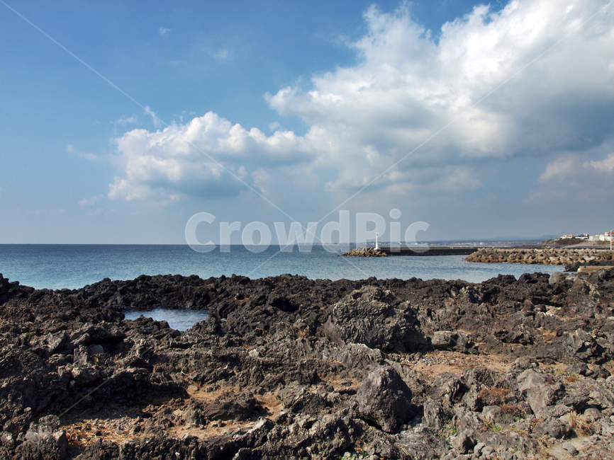 Olle Course 4,blue sky,breakwater,ocean,Jeju,white clouds,Seogwipo City,Olle trail,volcanic stone