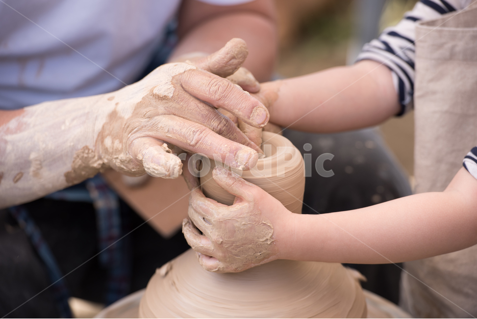 ceramic,spinning wheel,body part,artist,hand gestures,experience,clay,traditional crafts,children,tradition,pottery workshop,potter,chopping,Mud,dough,hand,ceramics,art,handwork,work,workshop,rotation,technology,Girls,master,work place,crafts,swing,person