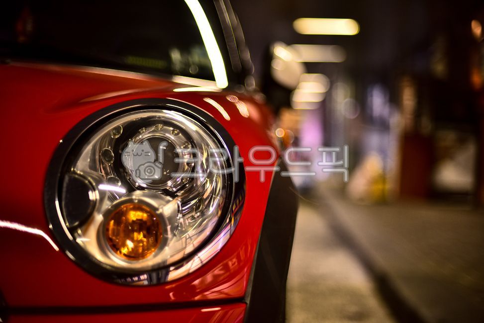 flare,Nighttime,mini car,headlamp,red car,car,light,background,writing,bokeh,road name,deserted,late at night,bokeh of light,close,headlight