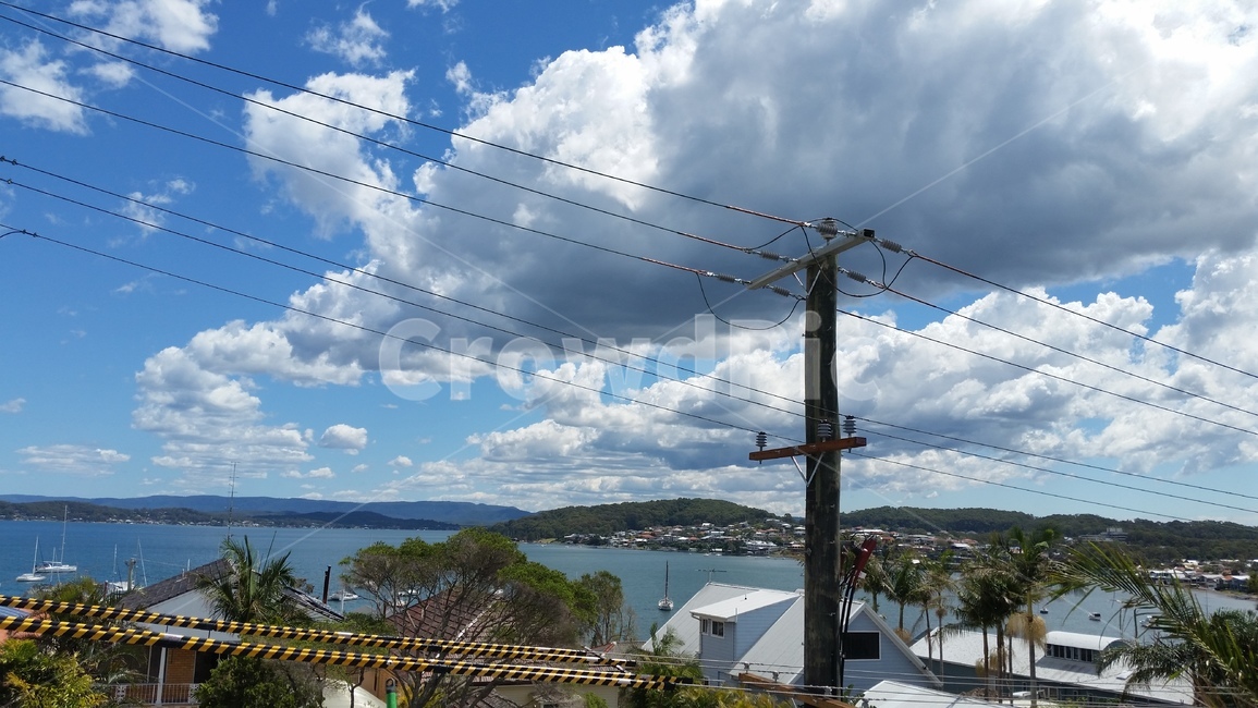 cloud,sky,blue,ocean,telephone pole