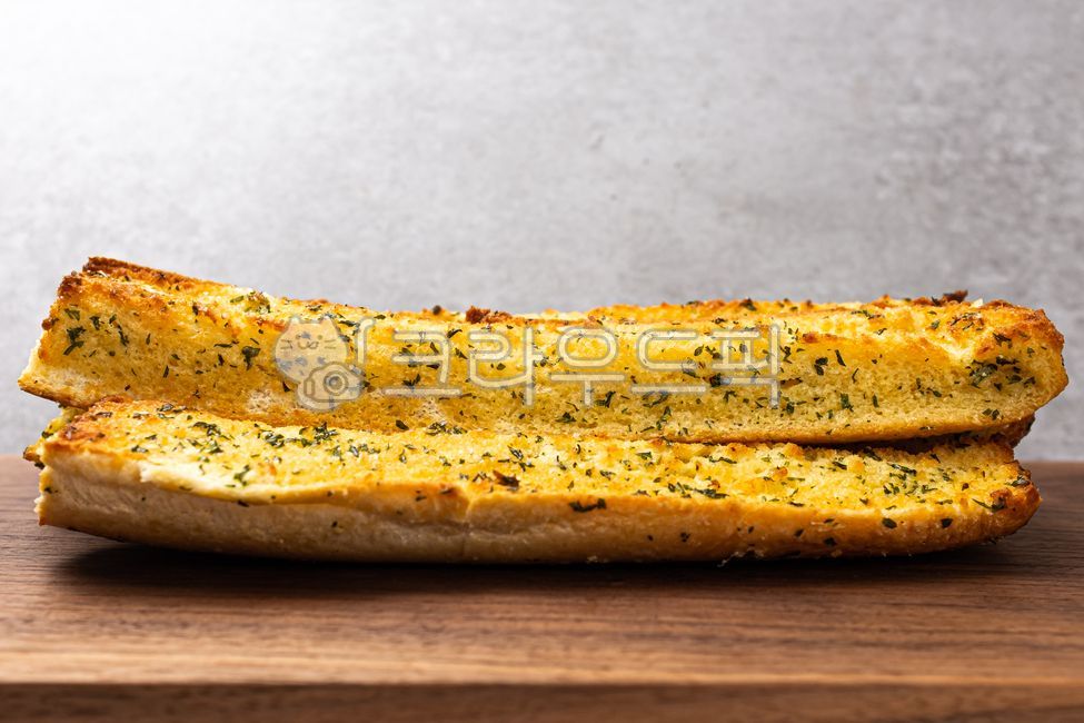 seasoning,garlic bread,sauce,Garlic Bread,parsley,honey,flour,Garlic Baguette Sticks,Food Ingredients,ingredients,stick,baguette,soft,Garlic Baguette,garlic,close up,bread,butter,ingredient,food,Herb,meal,grocery,sweet