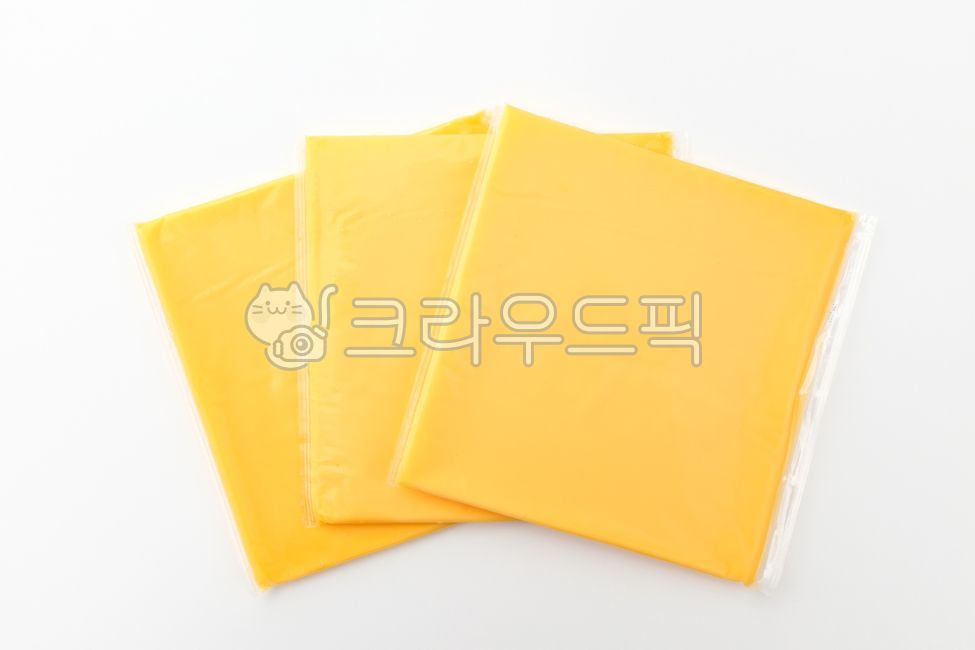 Dairy products,ingredient,savory,yellow,dairy product,food,cheese,thin,meal,square,oily,grocery,Food Ingredients,ingredients,Cheddar Cheese,Sliced Cheese