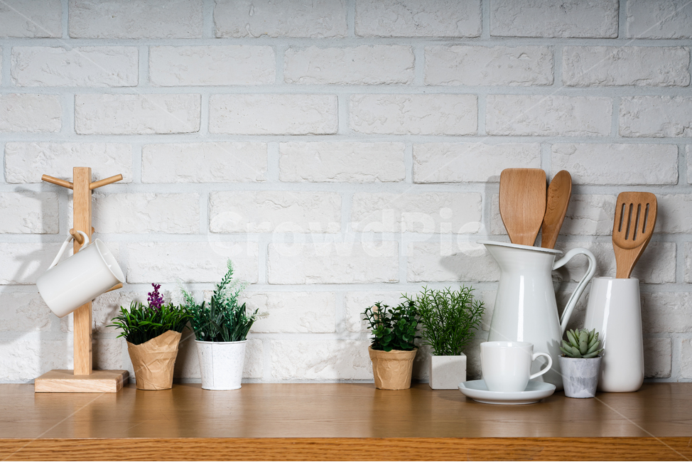 ceramic,spatula,cooking utensil,Cup drying rack,pattern,bright,Clean,inside,space,interior,pot,modern,trim,organize,coffee cup,neat,brick,cooking,kitchen utensils,kitchen,housewife,Woodenware,green,reflection,tree,Square,shelf,flower,spoon and chopsticks,