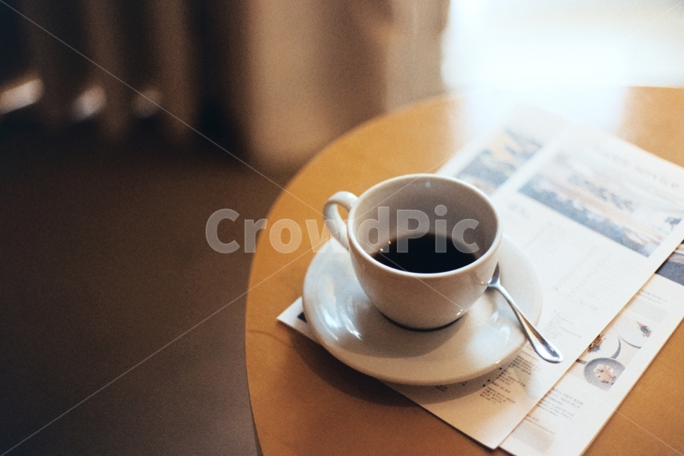 schedule,coffee cup,coffee,Americano,film,round dining table,film camera