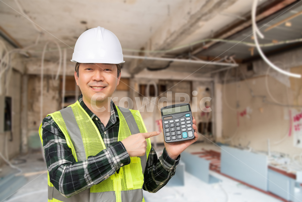 calculation,remodeling,Asian,working environment,building,safety,estimate,middleaged,hat,worker,laborer,budget,calculator,work,blank space,Japanese,labor,saving,upper body,hard hat,50s,labor costs,male,daily worker,concept,industry,interior,hand gesture,a