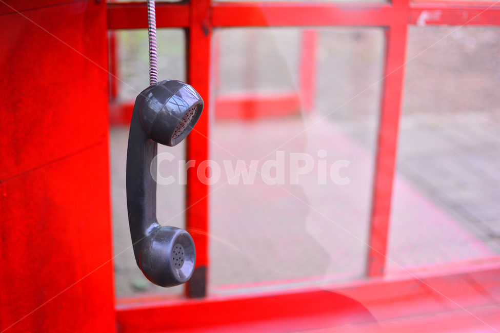 disconnection,public phone,receiver,goodbye,shock,telephone,sadness,declaration,red,call,parting,leave,hung up,hello,silence,communication,leaving,conversation,hurt,phone booth,farewell,hellow