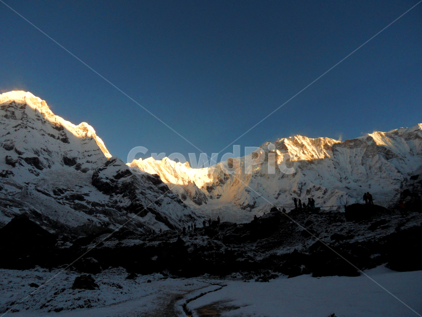 mountainrange,sunrise,winter,ice,rock,mountain,mountainouslandforms,mountainous terrain,sky,abc,annapurna,nature,mountain range,peak,slope,outdoors,background,snow,basecamp,nepal,dawn,landscape