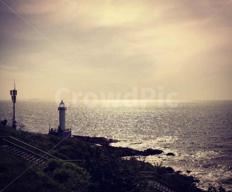 sky,sightseeing,lighthouse,nature,Baeksu Coastal Road,Lighthouse,sea,glory,tourist,ocean,background,sunset,sight,Tourist destination,Jeollanamdo