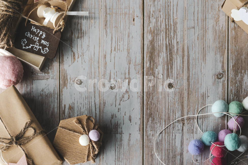 gift,string,wooden table,day off,pom pom,winter,fur decoration,heart shape,thanks,pastel,joy,pom pom decoration,vacation,season,decoration,table,decorative string,top view,edit,tree,ribbon,packaging,star shape,brown,christmas,White,background,vintage,Edit