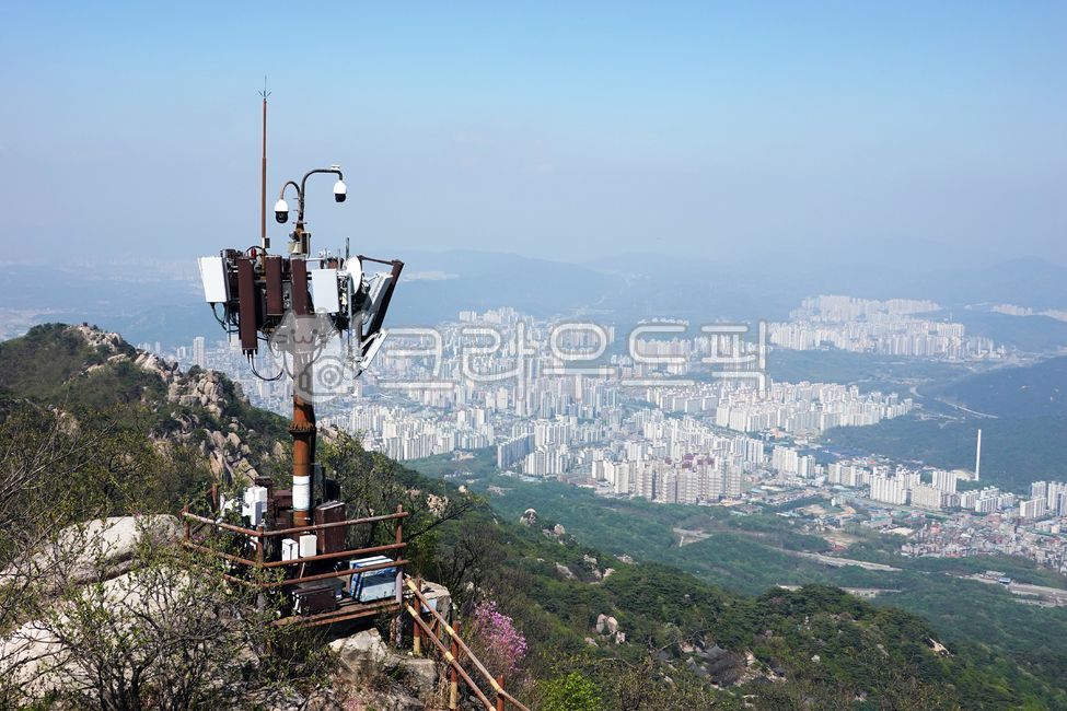 Communication base station,communication tower,mobile communication,internet signal,transmission and reception,tower,Dobongsan,mountain,landscape,technology,signal,network,equipment,view,city,outdoor,infrastructure,antenna,communication,
