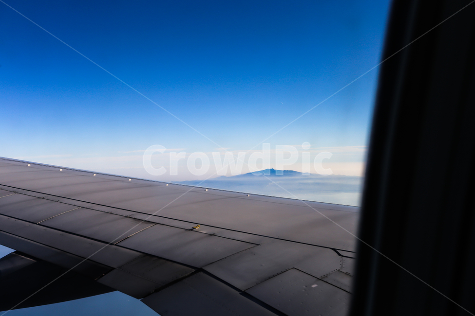 To look at,cloud,white,sash,sight,energy,traffic,sky,Panorama,background,transit,wing,Transportation,jeju island,air,speed,background image,engine,vacation,Z,High,shore,horizontality,technology,transportation,horizon,fly,White,blue,airplane,earth,window,A