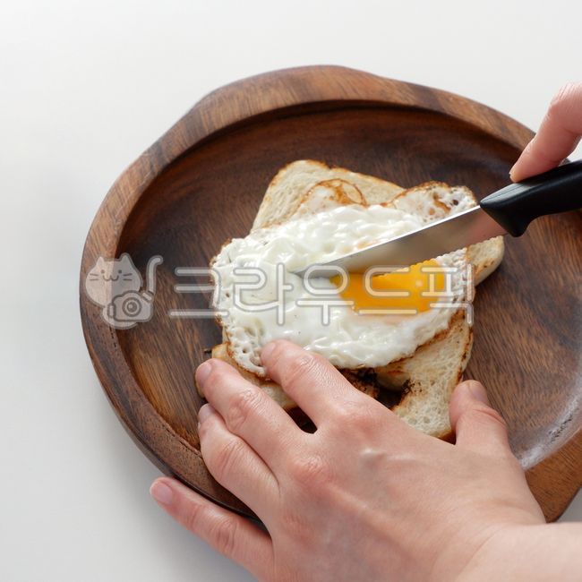 wooden plate,tray,egg,kitchenutensil,cookingware,wood,kitchen utensils,bread,cooking utensils,cookware,black,wooden bowl,wood bowl,food,Tray,toast,knife,wood plate