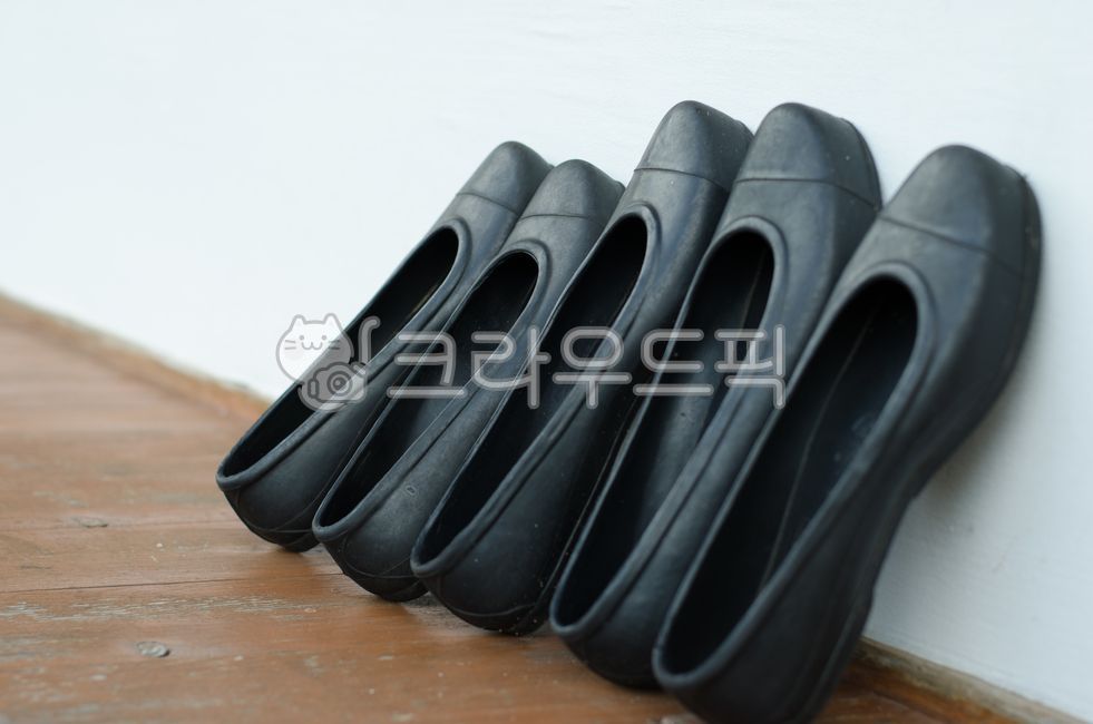 Floor,rubber shoes,old,black,shoes