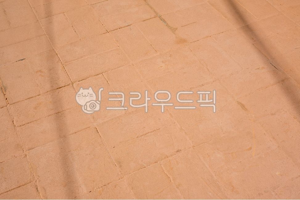 Paving tiles,floor texture,concrete floor,tile pattern,brown floor,urban floor,sidewalk block,texture background,rough surface,outdoor floor