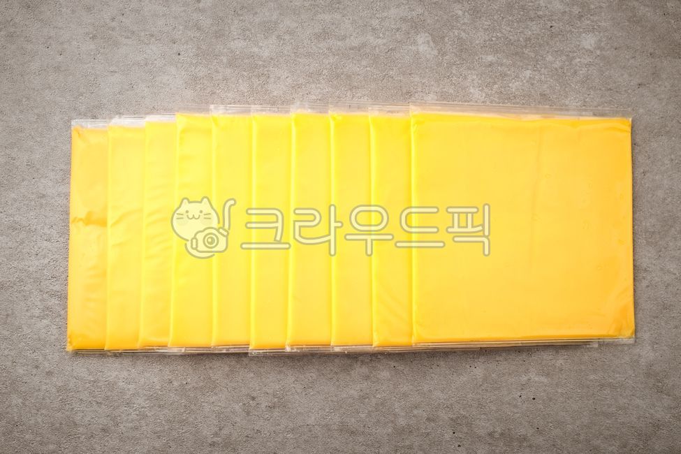 Dairy products,ingredient,savory,yellow,dairy product,food,cheese,thin,meal,square,oily,grocery,Food Ingredients,ingredients,Cheddar Cheese,Sliced Cheese