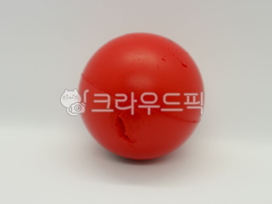 ball,scratched ball,sphere,red ball,toy