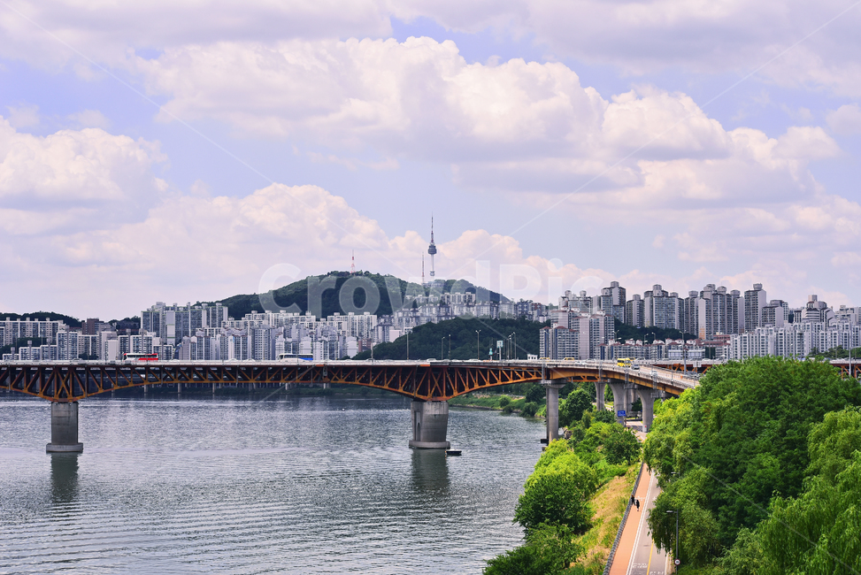Namsan,forest,apartment village,clouds,railroad bridge,scenery,Han River,trail,Seoul,road,cumulus clouds,riverside walkway,forest road,architecture,sky,apt,water,seoul,river water,background,bridge,arch,river,landscape