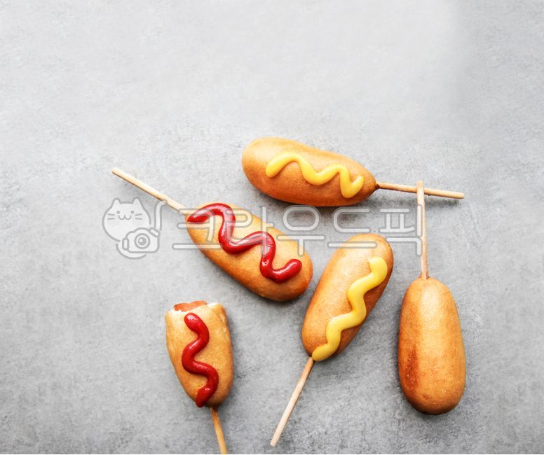 Hotdog,mustard,bread,hotdog,snack,corndog,corn dog,food,ketchup