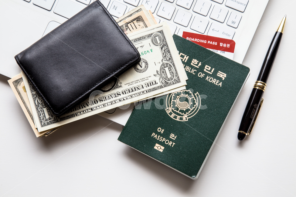 black color,office,US currency,laptop,US bill,dollar,banknote,computer,Economy,paper,passport,payment,currency,savings,Korea,keyboard,USA,wallet,business,technology,pencil,ballpoint pen,half wallet,travel,wireless technology,finance,internet