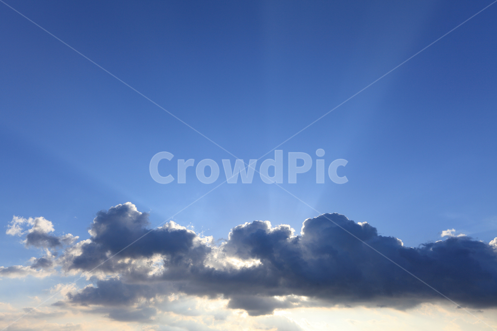 sky,nature,backlight,clouds,phenomenon,shine,heaven,cloud,sunlight,light,background,dark clouds,shining,natural phenomenon,sight,above the clouds