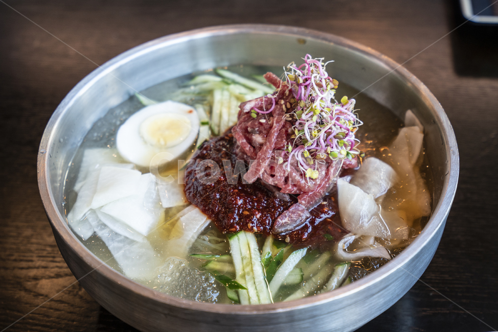 Mulnaengmyeon,egg,raw meat,Yukhoe Naengmyeon,bowl,food,Cold noodles,Hamheung Naengmyeon,meal,Korean Beef Yukhoe Naengmyeon