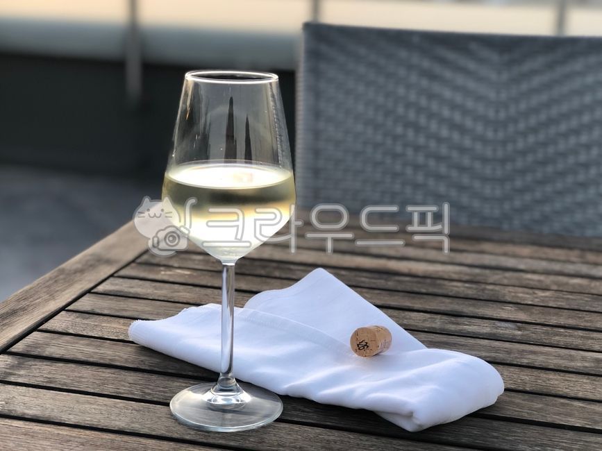 alcohol,wine glass,glass,outdoors,cork,wine