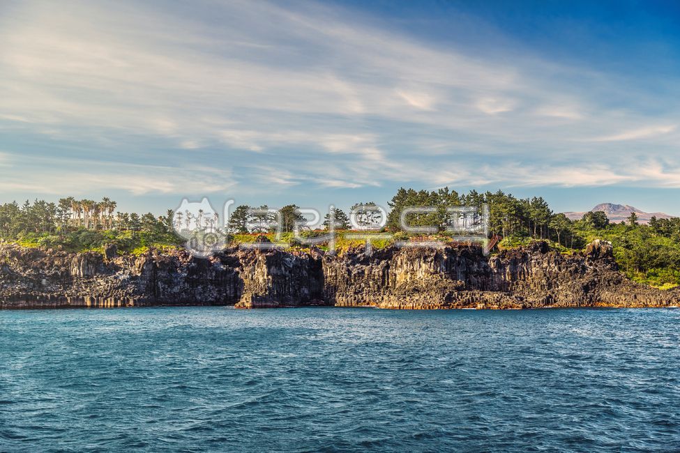 jeju island,Mt Hanlla,famous place,sea,rock,cloud,basalt,Coast,Daepo Columnar Joint,volcanic terrain,volcanic area,sky,Cliff,coastline,nature,island,Columnar joints,water,coast,outdoors,ocean,shoreline,Seogwipo,Tourist destination