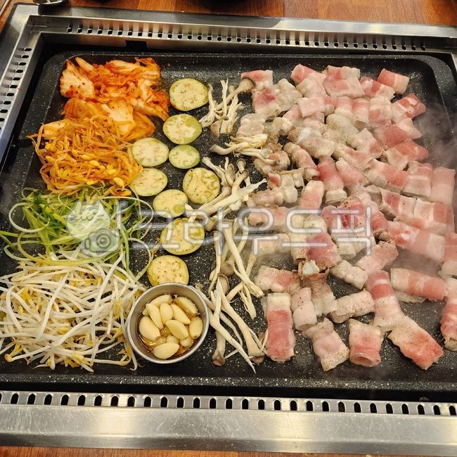 garlic,kimchi,meat,bean sprouts,green onions,pork,food,eggplant,Food