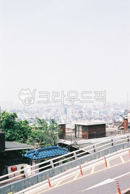fine dust,old house,town,building,seoul,hill road,view,twostory house,road name,cityscape,tiled house,high rise building