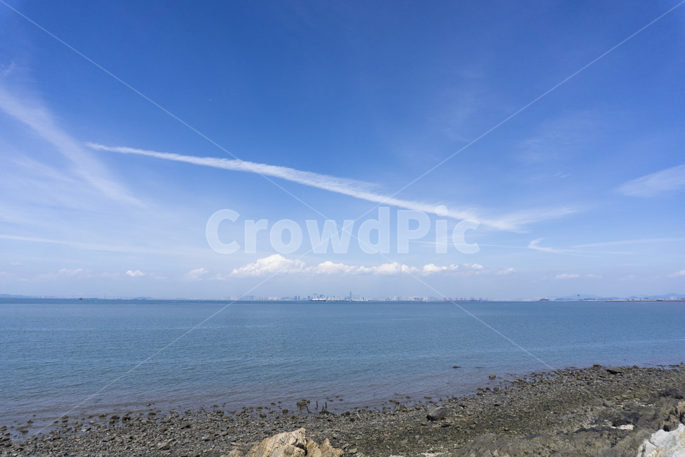 color,Bright color,clouds,Pebble,cloud,rock,road,season,floor,dirt road,sky,blue color,nature,west sea,gravel,contrail,horizon,blue,ocean,waterfront,west coast,ground,Sky blue,Sky of Autumn