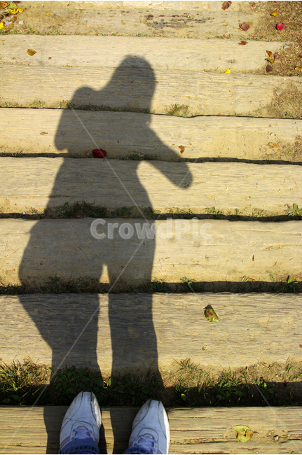 certifying shot,shadow,road,stairs,tree,self,shoes