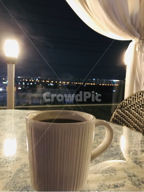 relaxed,night view,coffee,A cup of coffee,rooftop
