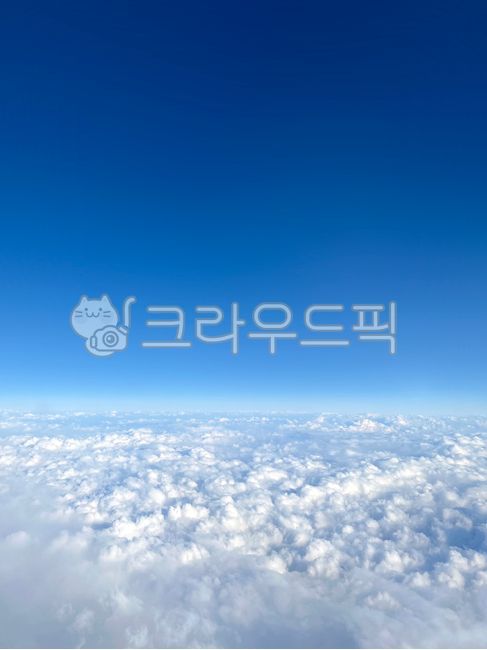 atmosphere,flight,blue background,aerial view,aviation,aerial,sky above the clouds,cloud,superb view,above the clouds,many clouds,sky,clean sky,nature,clear sky,clear,clean,blank space,Airplane sky,atmospheric clouds,blue,refreshing,background,earth