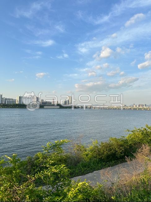 Sky,sea,river,clouds,grass,nature