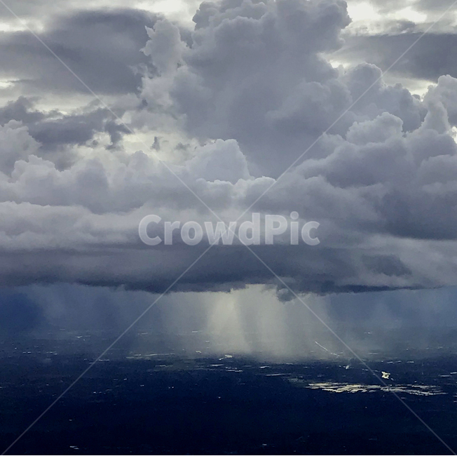 cloud,sky,rain,heavy rain,dark clouds,airplane,local heavy rain,Inside the plane