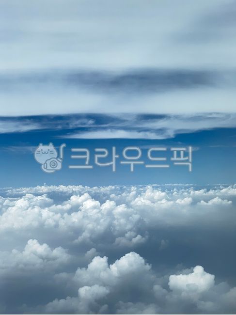 sky,cloud,outdoors,nature,above the clouds,azure sky,Cloudy,Inside the plane