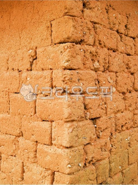 Rural,brick background,mud wall,countryside,brick,ocher,design background,mud brick,fence