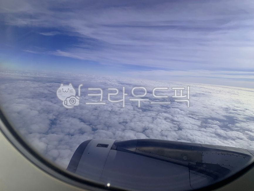 sky,flight,top view,skyview,onboard,airview,air,inside,cloud,view,sky view,View outside the window,leave,airplane,above the clouds,window,Inflight view,Inside the plane