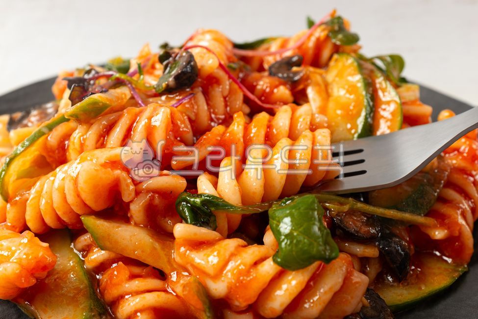 Fusilli salad,pasta salad,fusilli,fusilli pasta,tomato sauce,salad,olive,cucumber,vegetable,greens,sauce,food,meal,fresh,sour