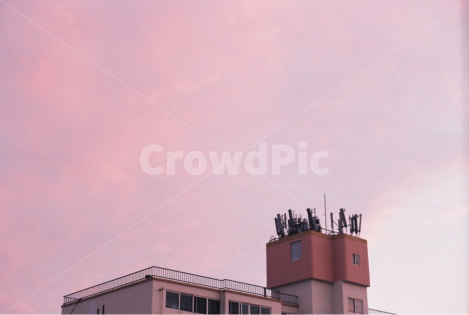 sky,pink sky,rooftop,building,azure